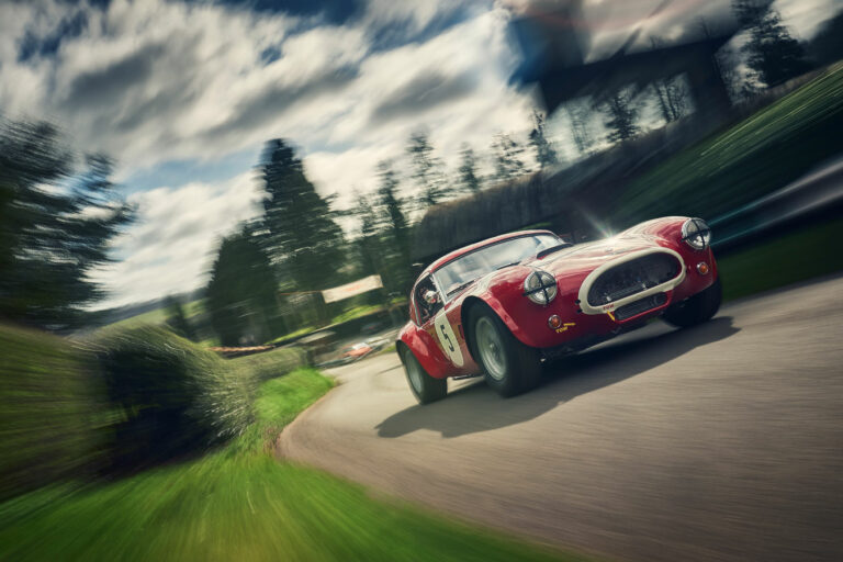vintage race car on hill climbing route